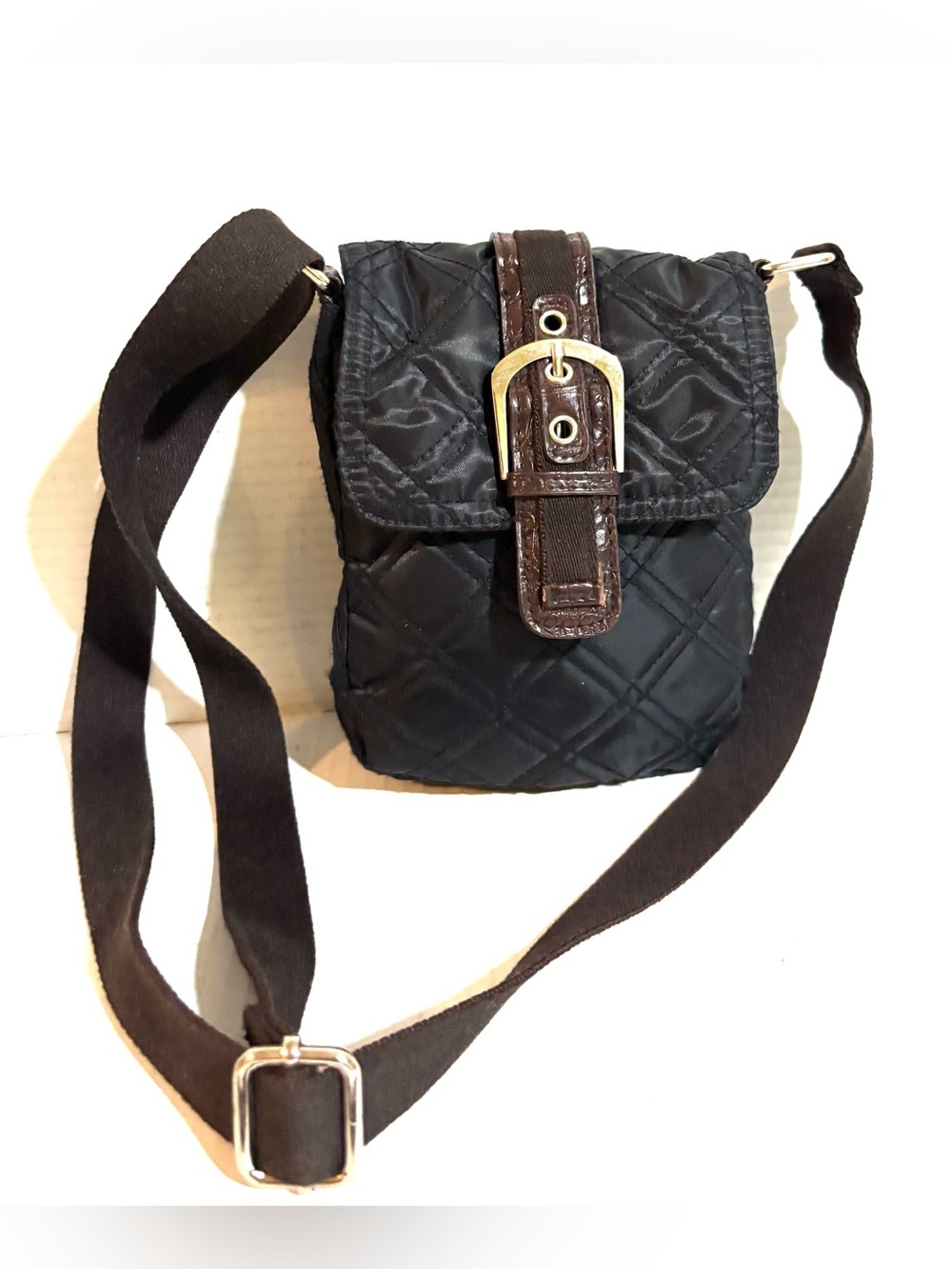 Quilted Black Crossbody Bag with Brown Buckle Strap